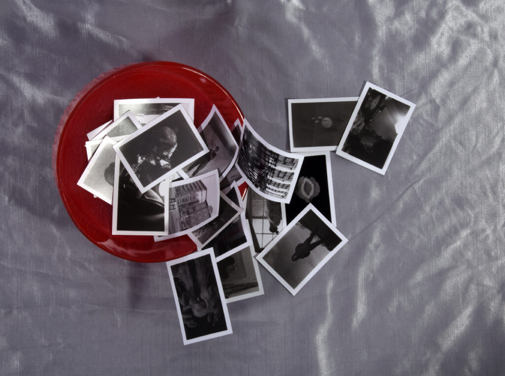 Megan's photographic prints, glass bowl and cloth